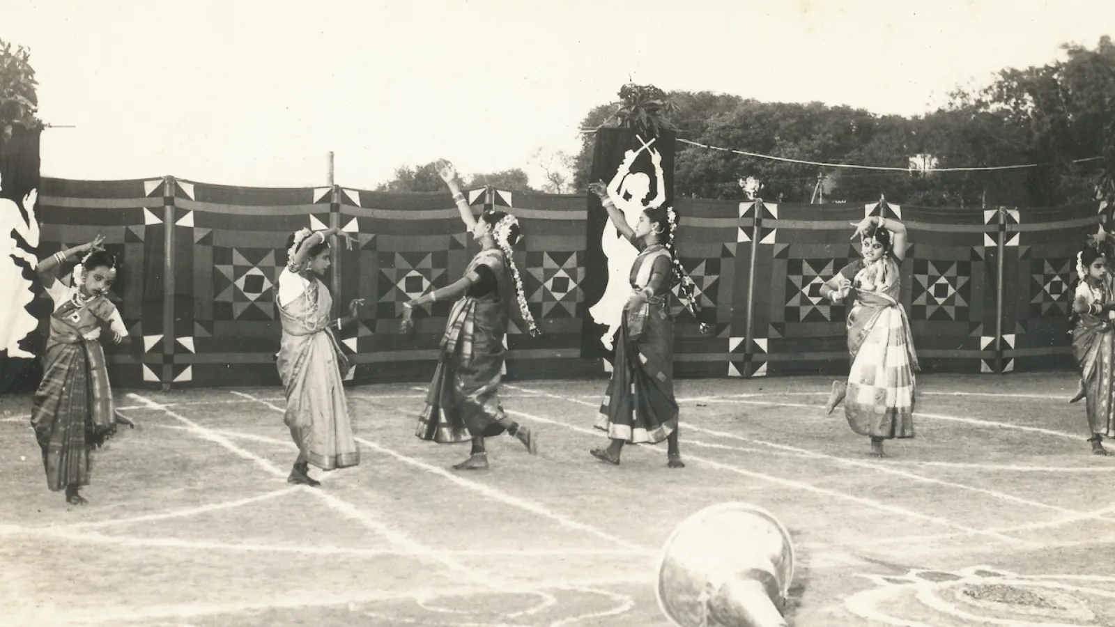 Anupa dancing with group outside