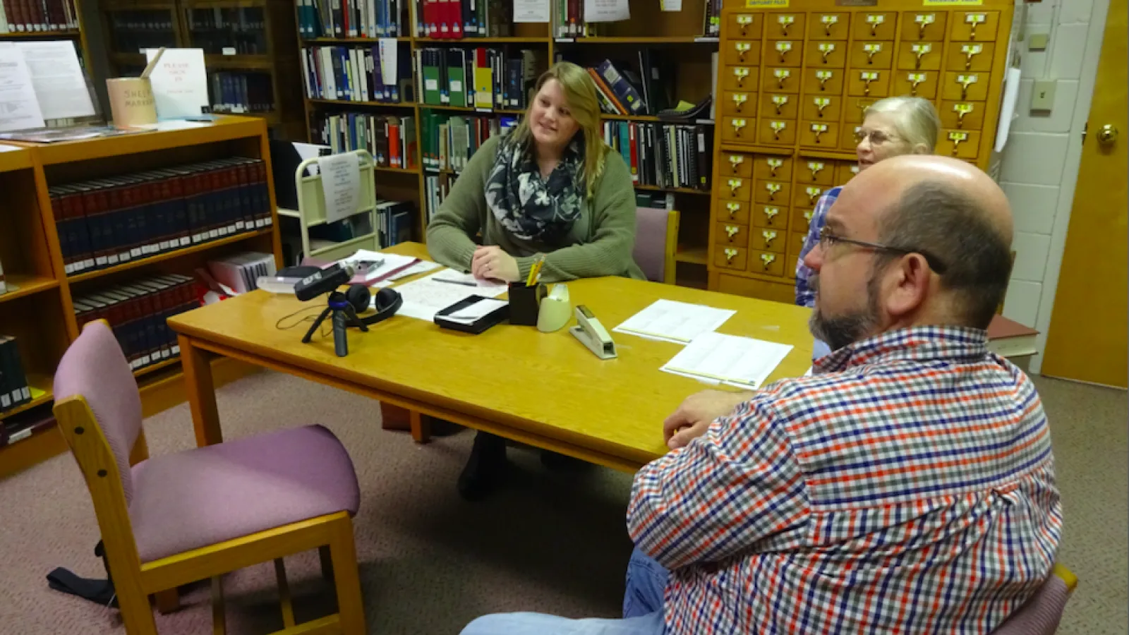 Fieldworker Sarah Hinkelman interviewing Pike county librarian Tom Adkins