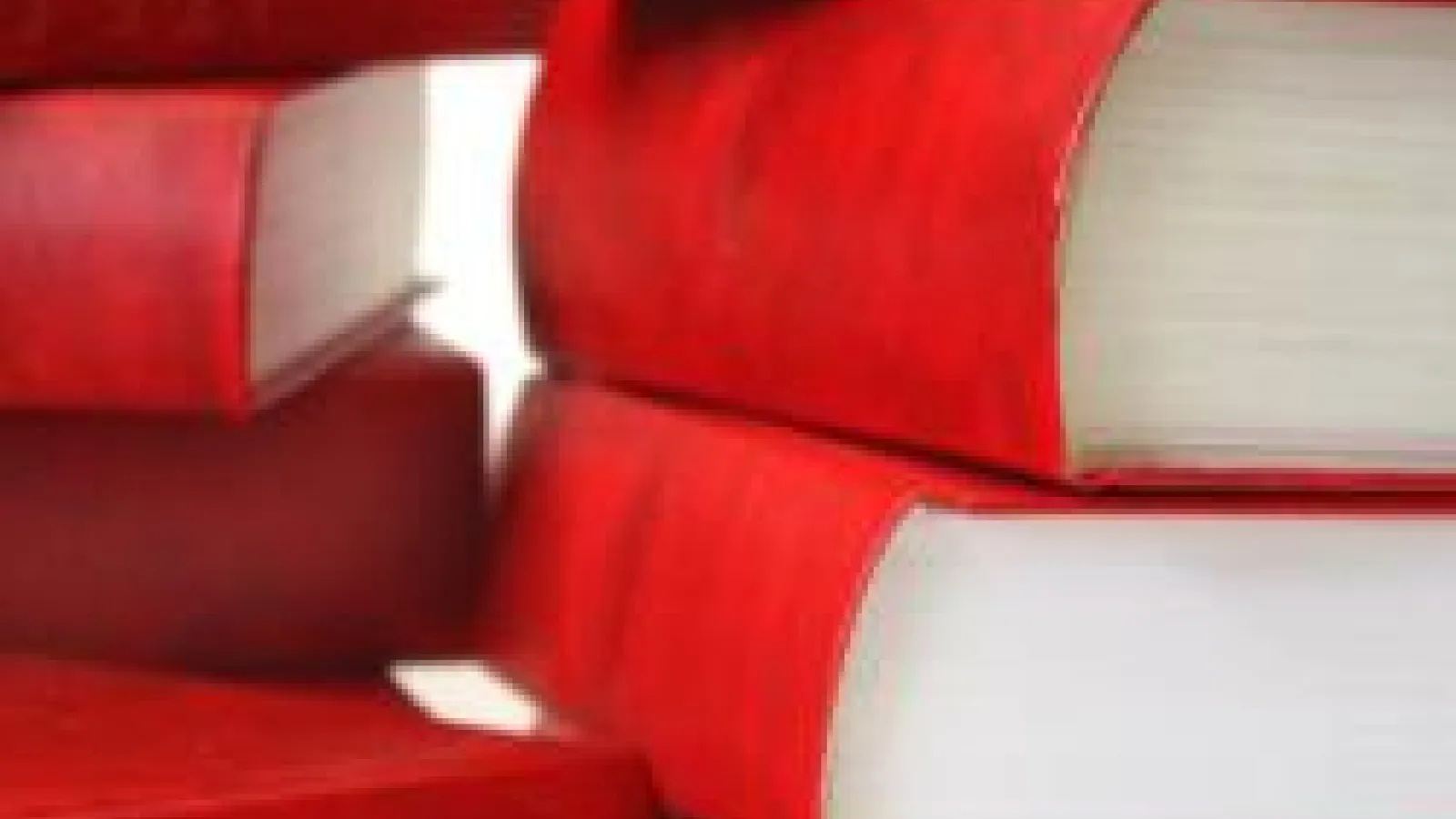 Red titleless stacked books